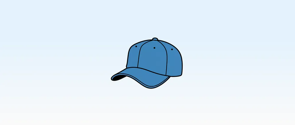 A blue baseball cap on a soft blue gradient background